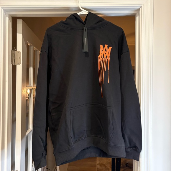 AMIRI Drip Logo Hoodie Black Orange Paint Drip Graphic NEW Size L - Picture 2 of 5